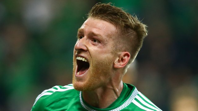 Skipper Steven Davis celebrates one of his two goals in the 3-1 win over Greece which secured Northern Ireland's Euro 2016 qualification