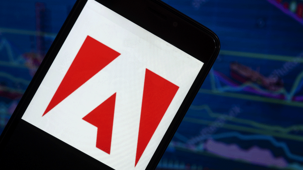 Логотип Adobe на смартфоне
