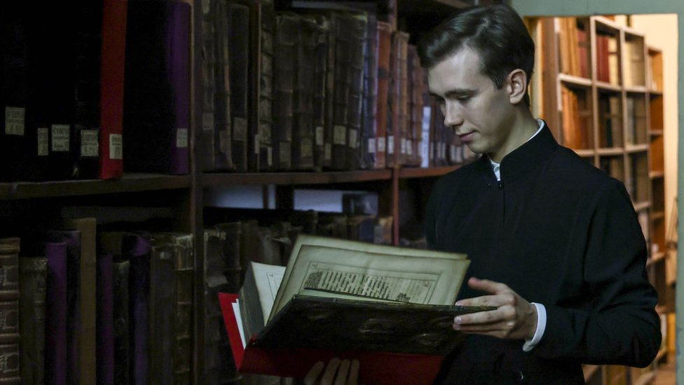 Teenager reading a book