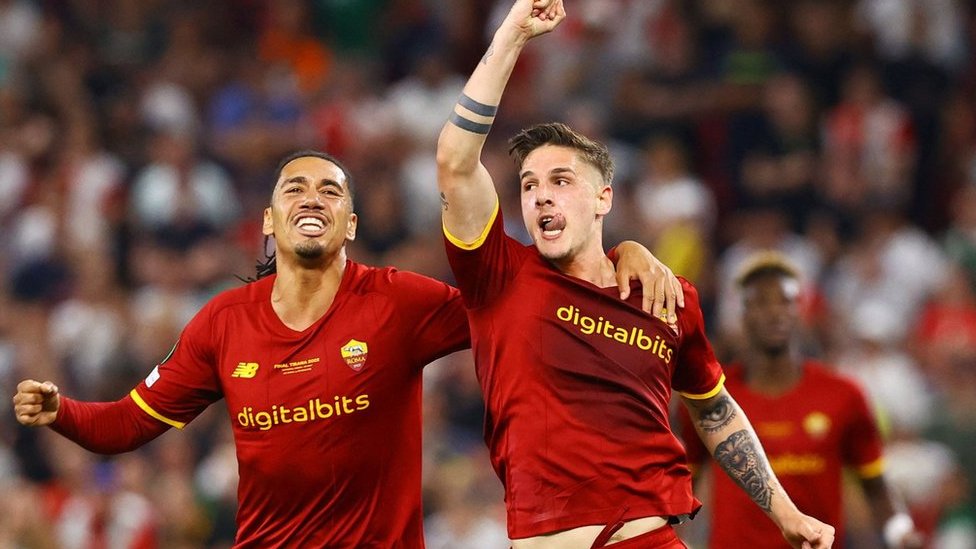 AS Roma's Nicolo Zaniolo celebrates scoring their first goal with Chris Smalling
