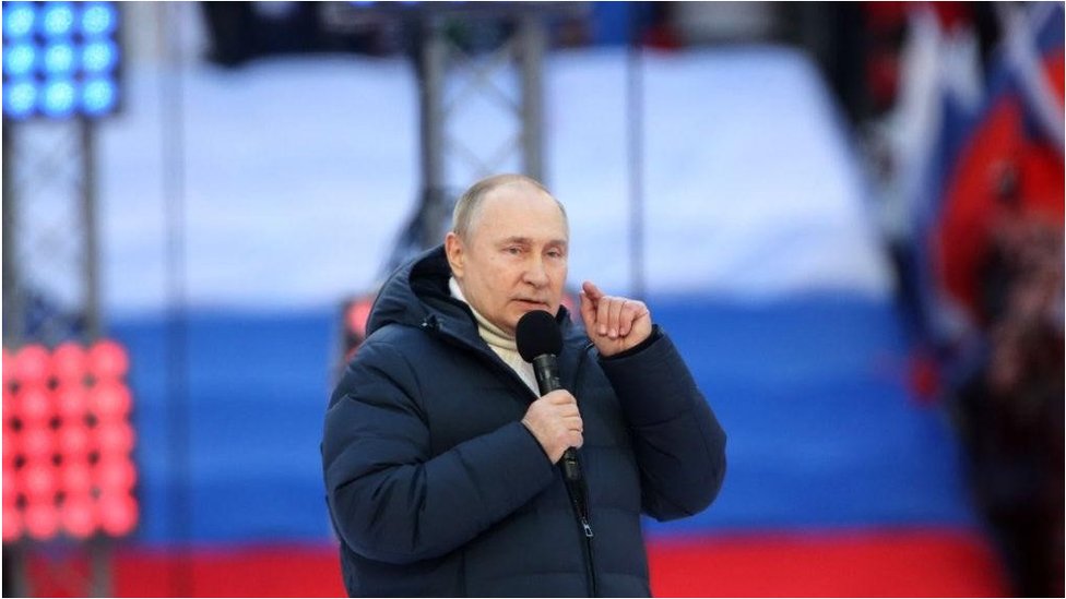 Russian President Vladimir Putin speaks during a concert marking the anniversary of the annexation of Crimea, on March 18, 2022 in Moscow, Russia.