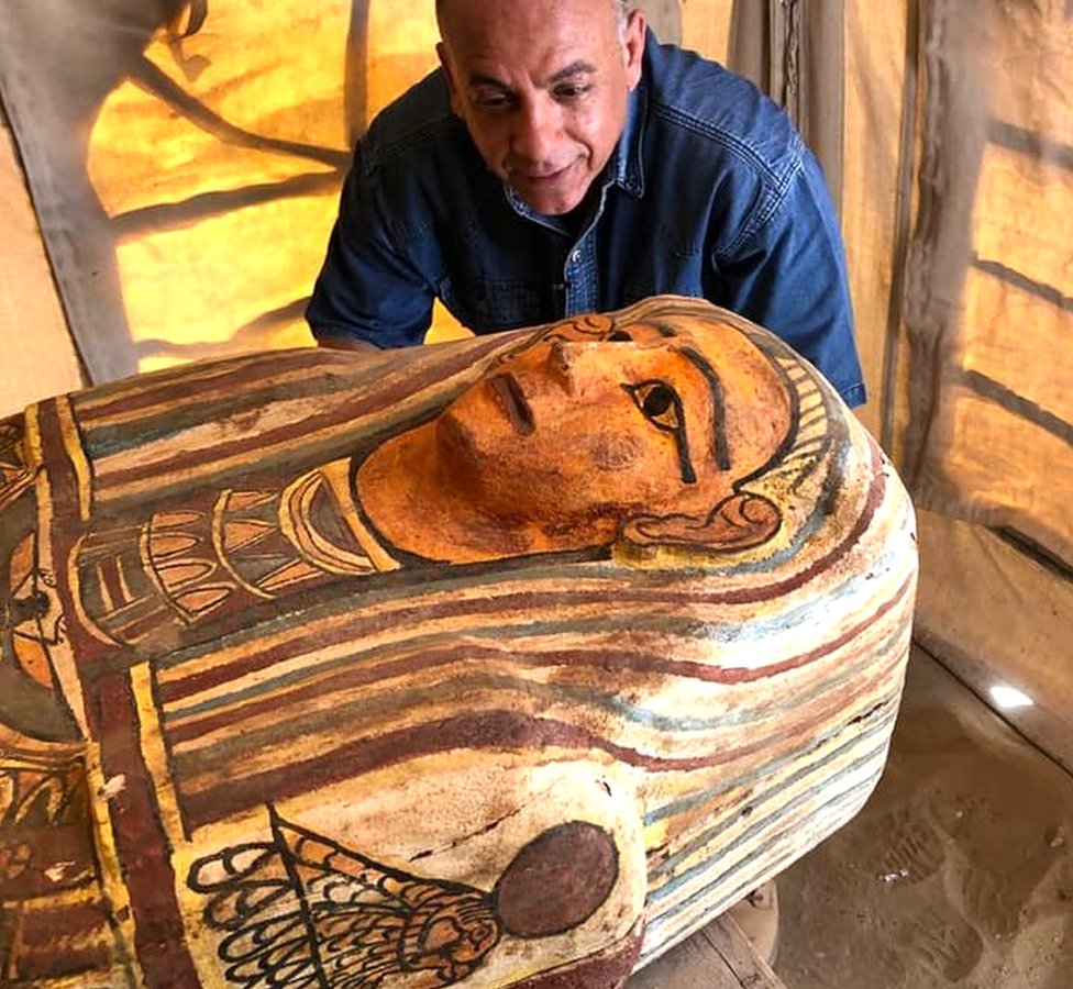 A wooden sarcophagus discovered down an ancient well in Saqqara, Egypt