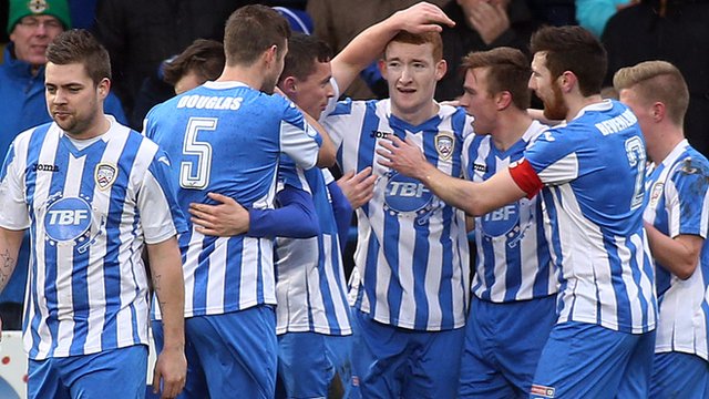 Coleraine players celebrate with goalscorer Rodney Browne