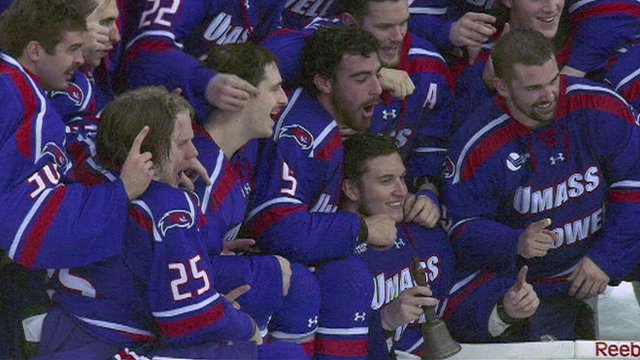 Umass Lowell celebrate winning the inaugural Belpot trophy at the Friendship Four