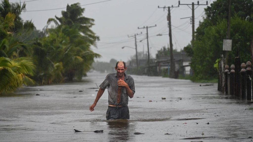 How is climate change affecting hurricanes, typhoons and cyclones?