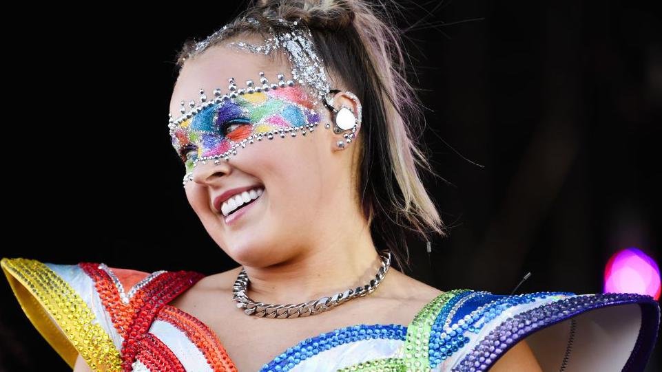 has jojo siwa ever smoked a cigarette responds to being 'pregnant' with Chris Hughes' baby JoJo Siwa rhinestone rainbow Cloud