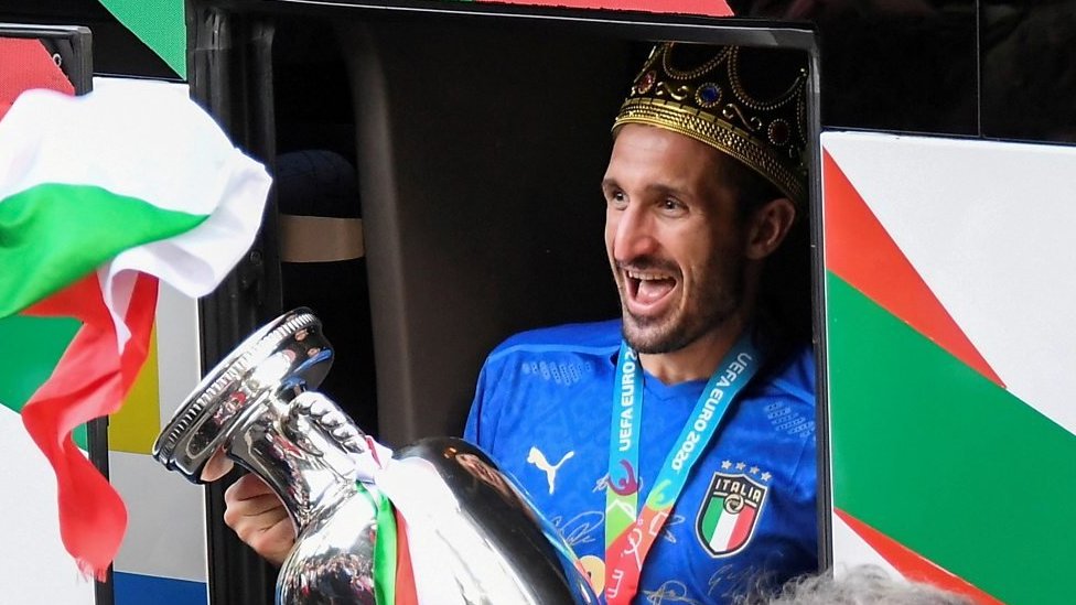 Italian football Captain Giorgio Chiellini steps off bus with trophy