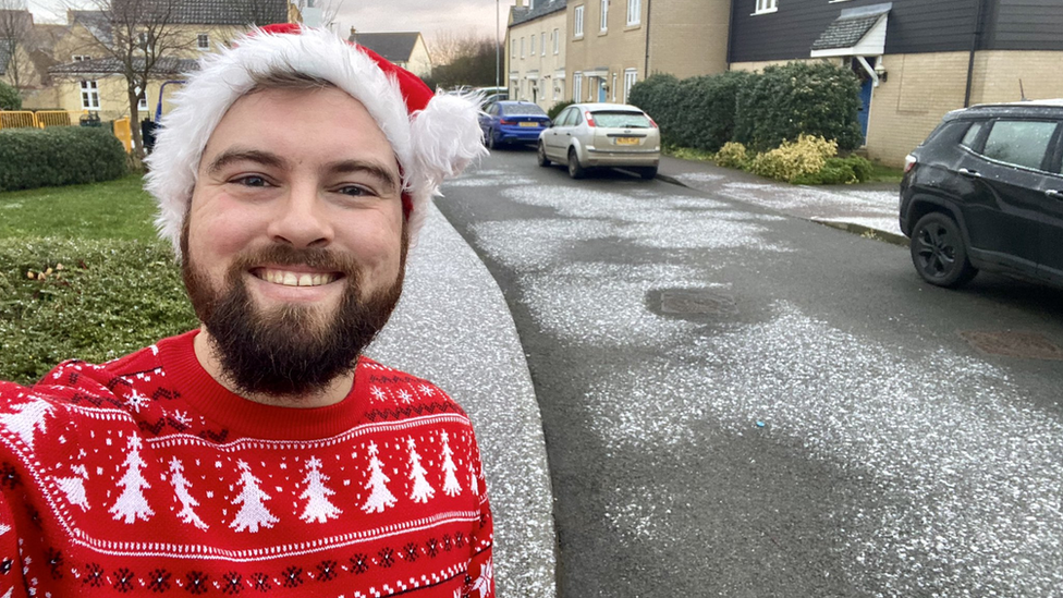 Andy Brunning taking a selfie with the "sprinkling of snow" in Ely, Cambridgeshire.