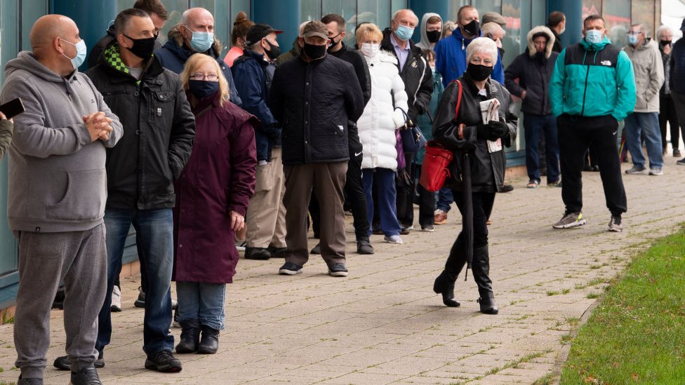 Queue of people outside Merthyr Tydfil Leisure Centre