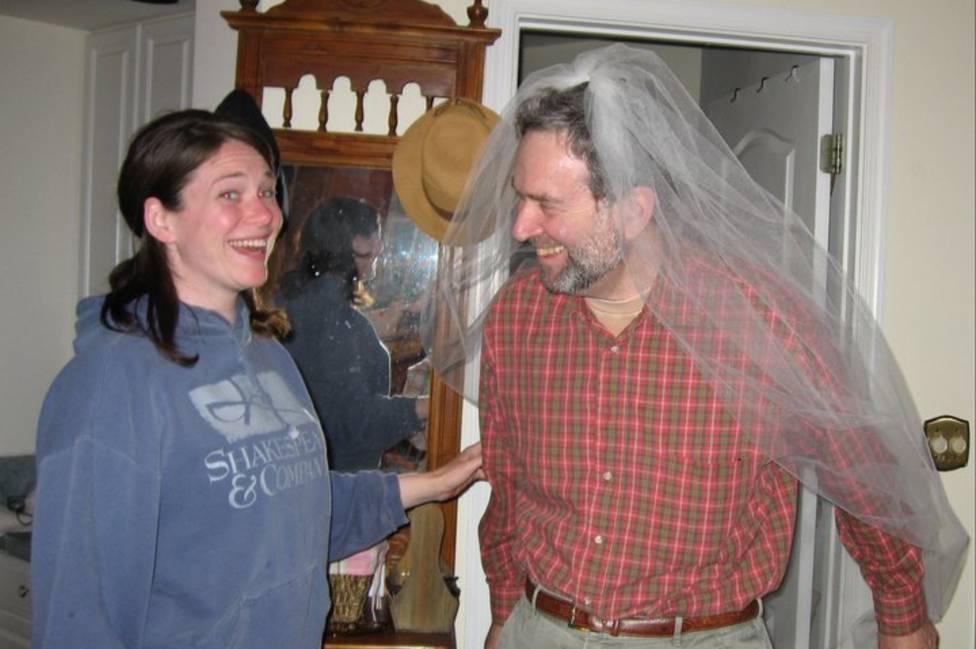 Sara Faith Alterman and her father Ira wearing a wedding veil