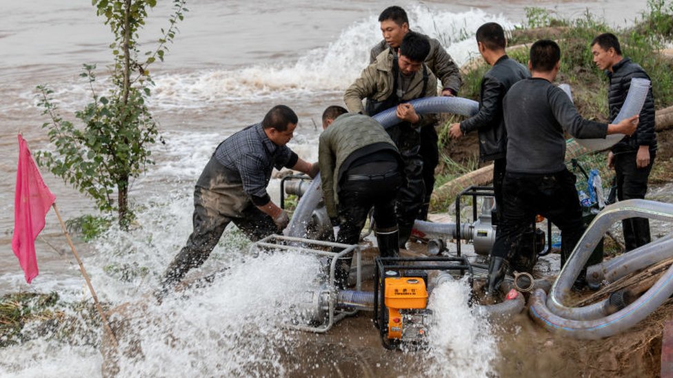 China floods: Coal price hits fresh high as mines shut