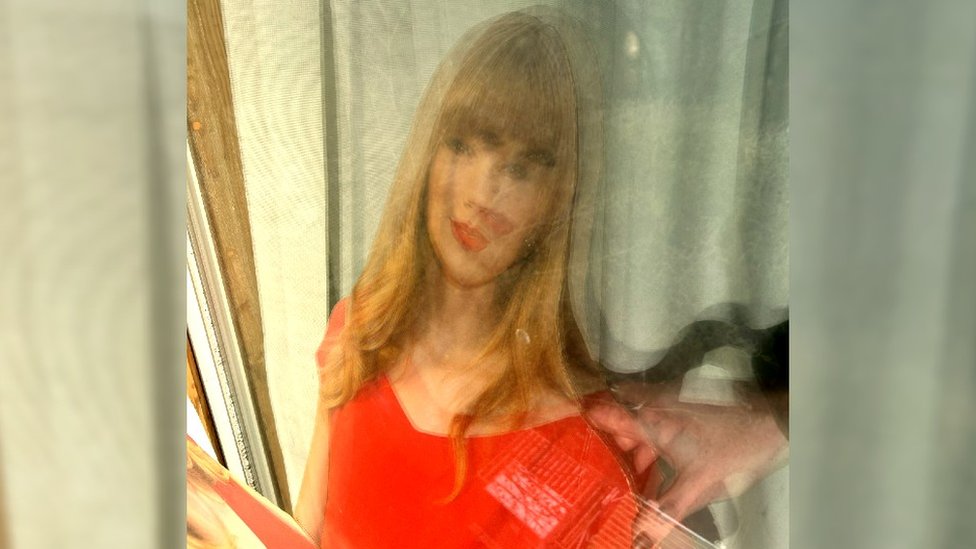 Hundreds bid to save Manchester's Taylor Swift cardboard cut-out