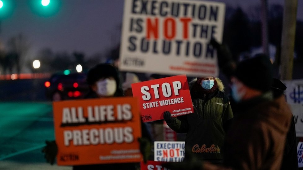 Protesters outside the prison in Terre Haute, Indiana, U.S. January 12, 2021