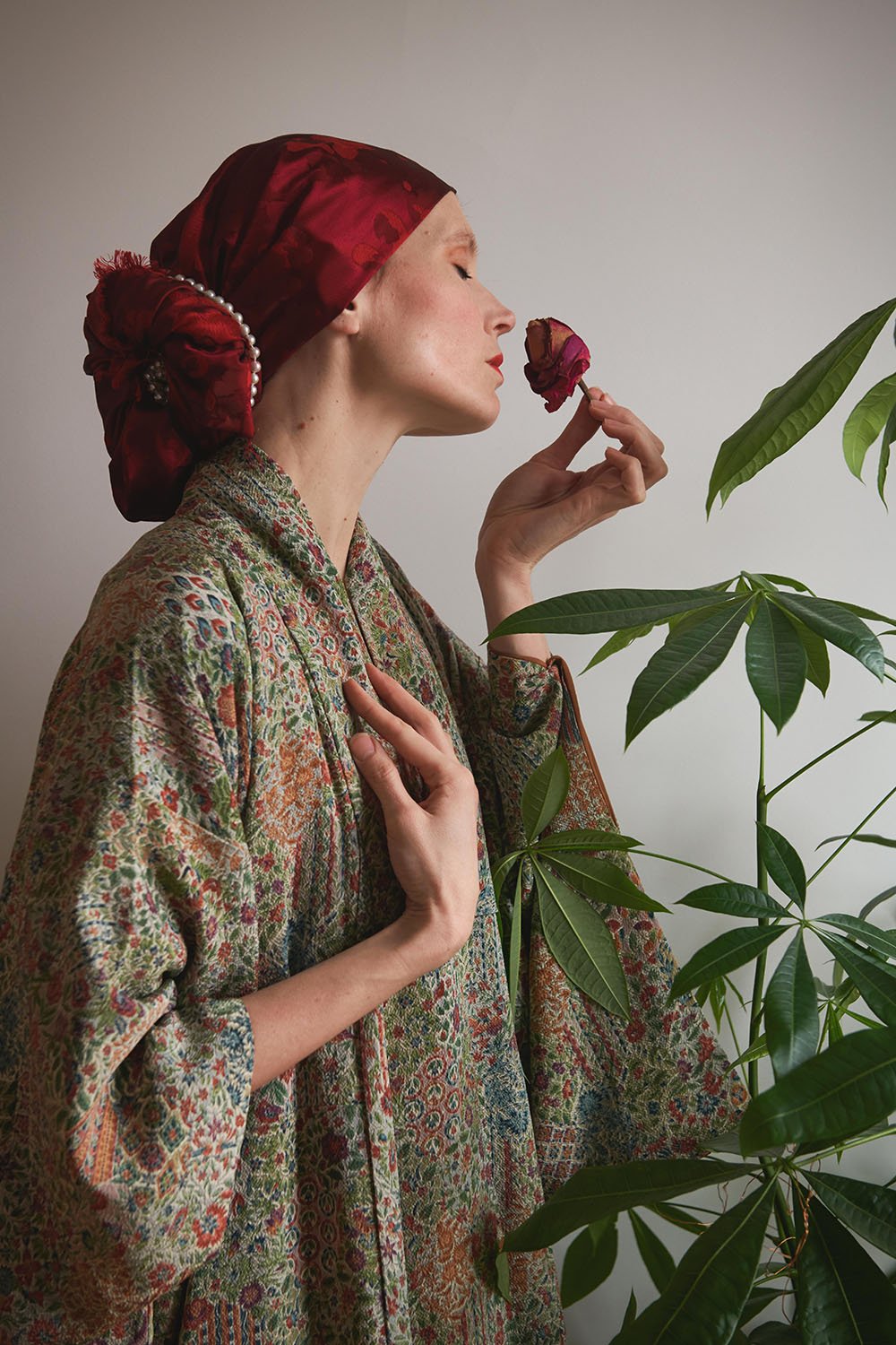 Julia Keil smelling a rose