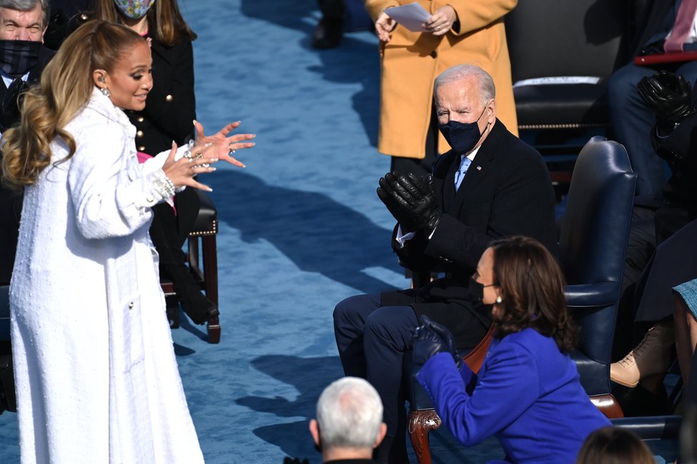 Jennifer Lopez gestures to Kamala Harris