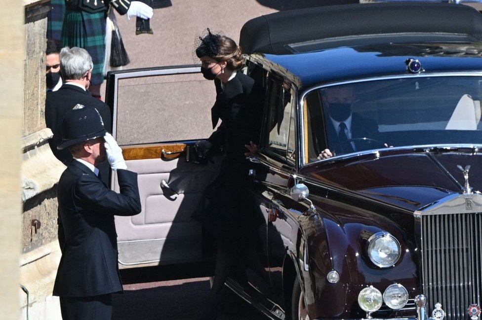 Catherine, Duchess of Cambridge, arrives in the quadrangle ahead of the ceremonial funeral procession of Britain's Prince Philip, Duke of Edinburgh to St George's Chapel in Windsor Castle in Windsor,