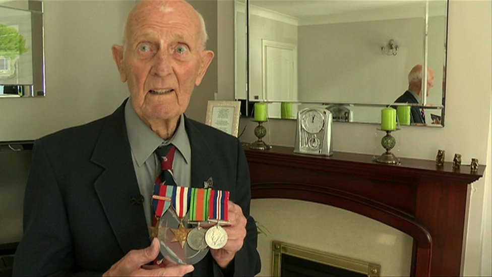 WW2 veteran 'on top of the world' to get medals back - BBC News