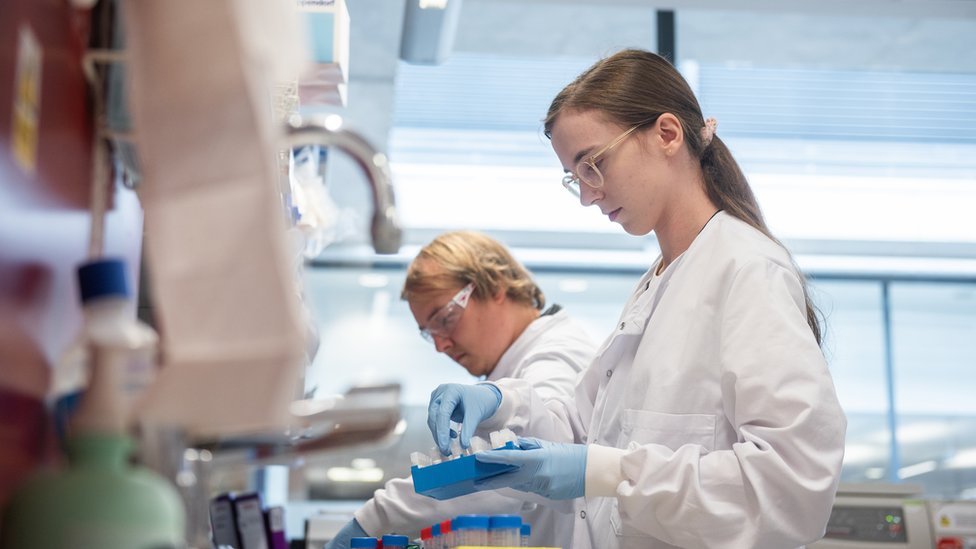 Laboratory scientist / technician handling blood samples from coronavirus vaccine trials at the Jenner Institute, University of Oxford on June 25, 2020