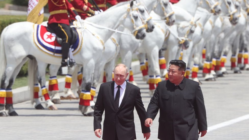 Russian President Vladimir Putin (L) and North Korean Supreme Leader Kim Jong Un (R) attend a welcoming ceremony on June 19, 2024 in Pyongyang, North Korea.