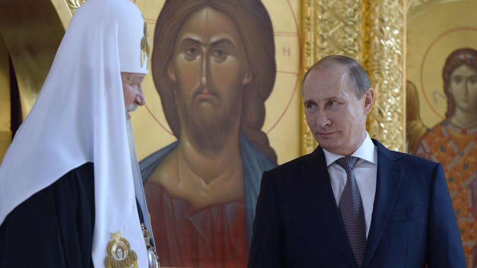 Patriarch Kirill of Moscow and All Russia (L) and Russian President Vladimir Putin (R)