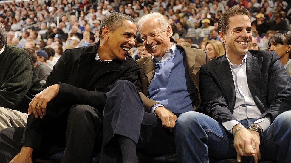 Hunter and Joe Biden, and Barack Obama at a college basketball game in 2010