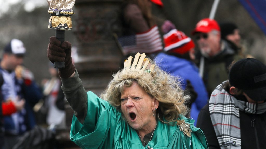 Leigh Ann Luck dressed up as the Statue of Liberty shouts as supporters of President Donald Trump gather near the Capitol building in Washington