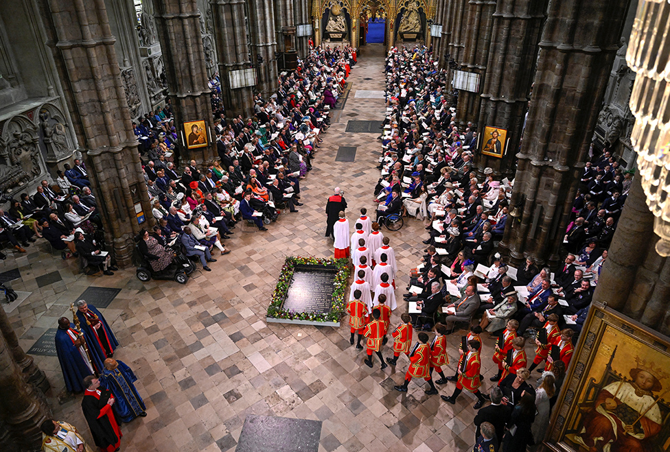 A general view inside Westminster Abbey as the Choir arrive ahead of the Coronation of King Charles III and Queen Camilla