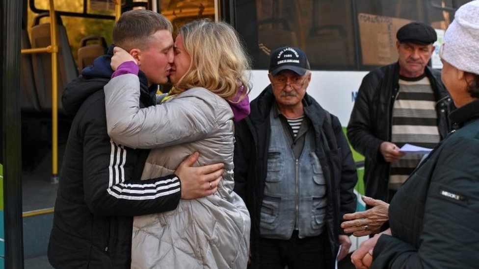 A Russian reservist bids farewell to relatives in the Siberian city of Omsk, Russia. Photo: 7 October 2022