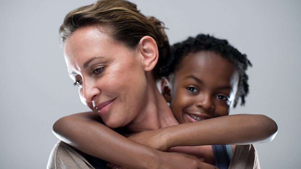 White woman with black child
