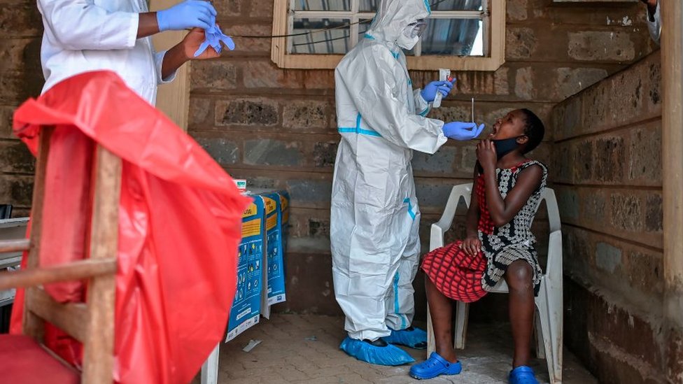 Medics performing coronavirus tests in Kibera, Nairobi, Kenya - October 2020
