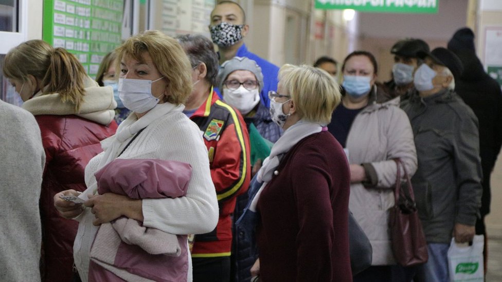 People wait in line at Omsk's City Hospital No 17