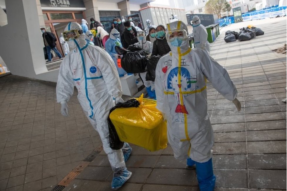 Coronavirus: Wuhan to ease lockdown as world battles pandemic - BBC News