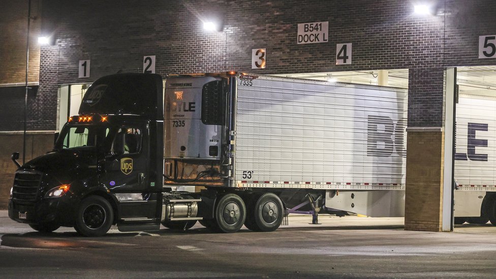 A truck is positioned at the loading dock of the Pfizer Inc., manufacturing and storage facility in Portage, Michigan, USA, 13 December 2020.