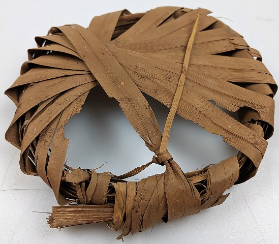 Artefacto de 2.100 años de antigüedad de hojas de palma dátil