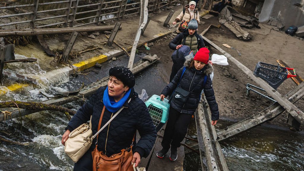 War in Ukraine: Taking cover in a town under attack