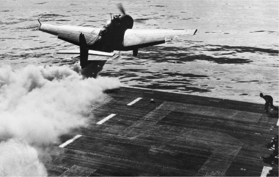 A Grumann TBF Avenger makes a jet-assisted take-off in the Pacific in World War Two