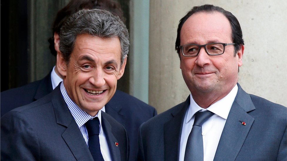 Николя Саркози (слева), бывший президент и нынешний глава политической партии Les Republicains, и президент Франции Франсуа Олланд после встречи в Елисейском дворце в Париже, Франция (22 января 2016 г.)