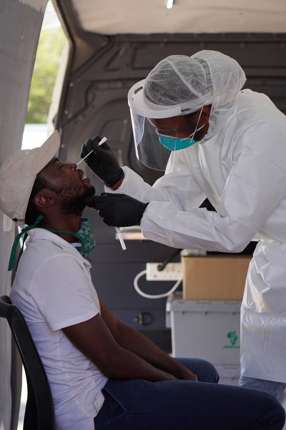 Mzwakhe Mohlaloganye testing a patient