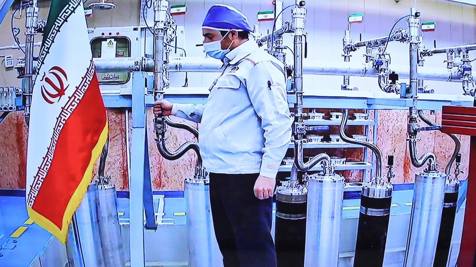 A handout picture made available by the Iranian presidency shows a technician working inside the Natanz uranium enrichment plant during a video conference with President Hassan Rouhani on the occasion of Iran Nuclear Technology Day (10 April 2021)