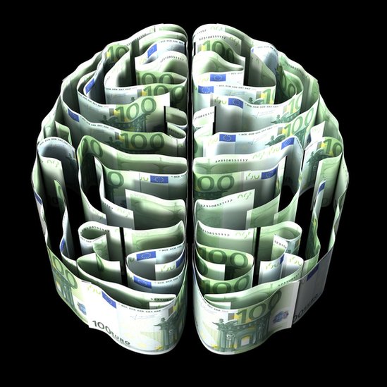 Illustration of a brain made up of banknotes.