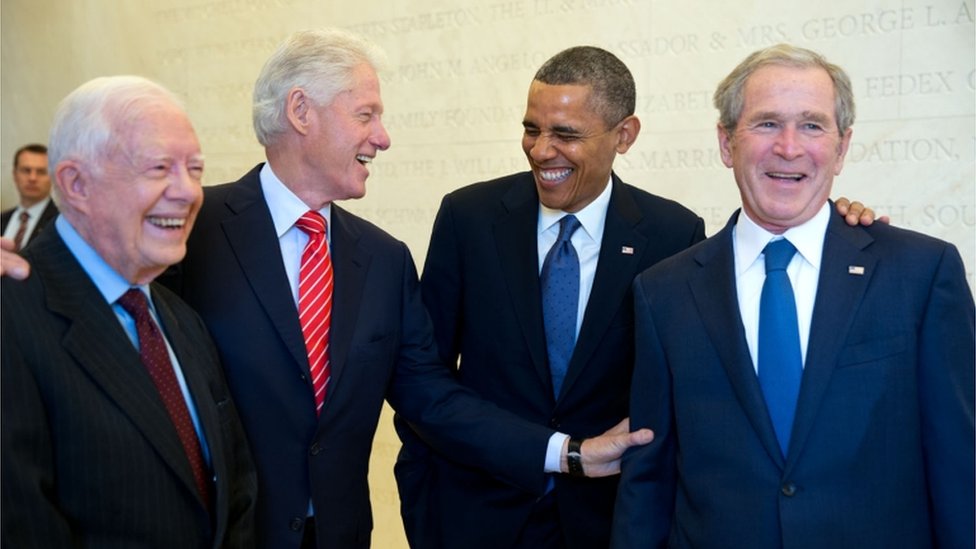 Presidents Carter, Clinton, Obama and Bush wait backstage to be introduced during the dedication of the George W. Bush Presidential Library and Museum