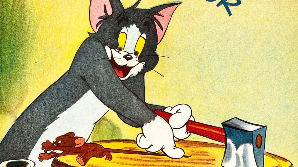 Cartel de Tom que sostiene la cola de Jerry.