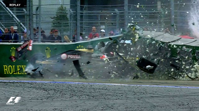 Romain Grosjean crashes his Lotus during the Russian Grand Prix