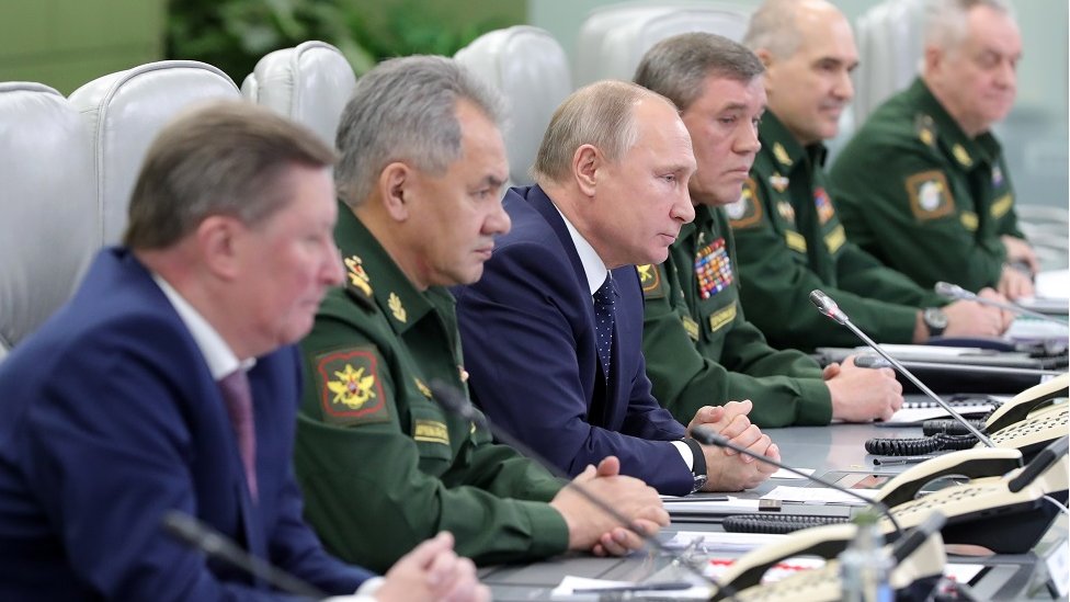 Putin and his defence chiefs watch a hypersonic missile launch via video link in 2018
