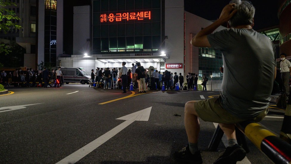 Media and spectators gather outside the Seoul National University hospital on Jul 9, 2020,