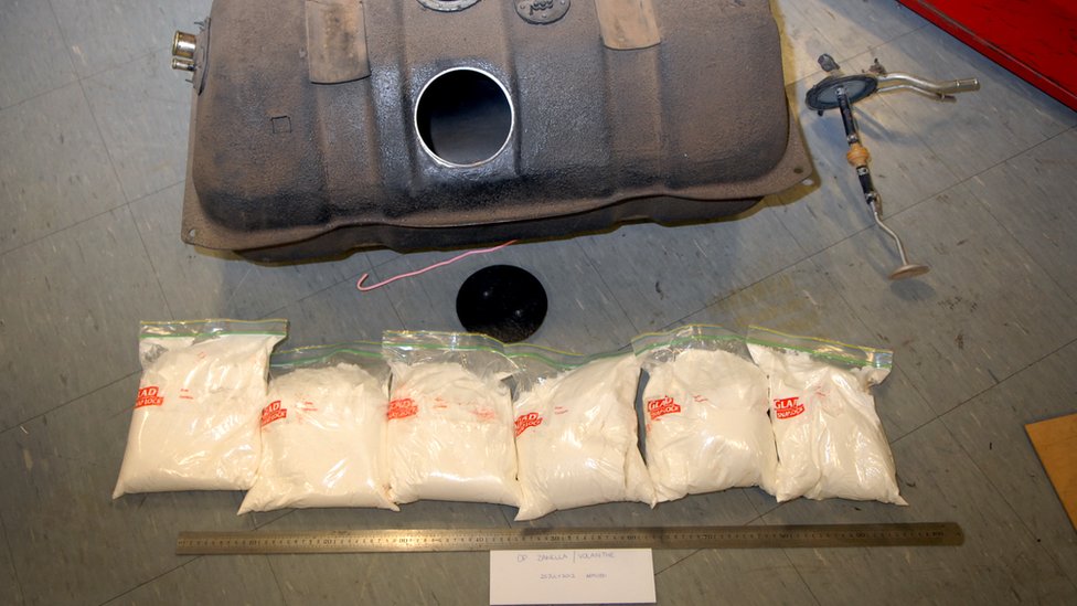 A petrol tank and packets of drugs