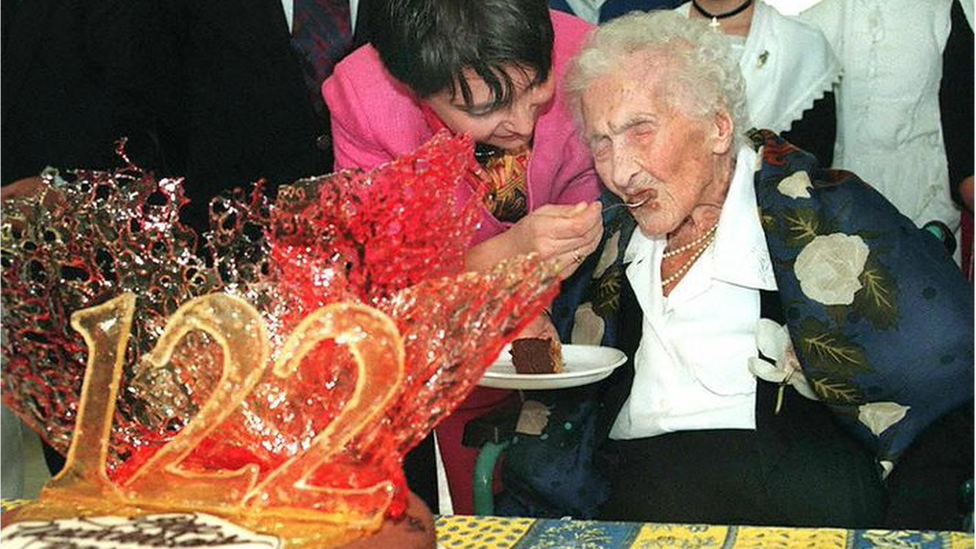 Jeanne Calmet being fed cake on her 122nd birthday in 1997