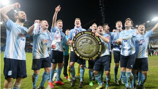 Ballymena United players celebrate winning the County Antrim Shield