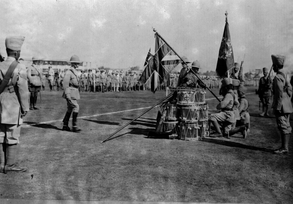 The Duke of Connaught (1850 - 1942) presenting colours at Poona to the 110th Madras.