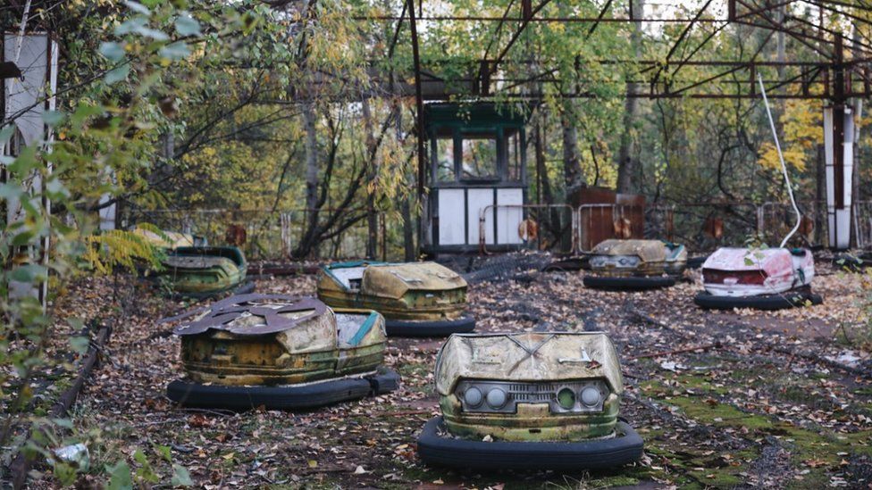 Abandoned playground in Pripyat a town near Chernobyl nuclear power plant